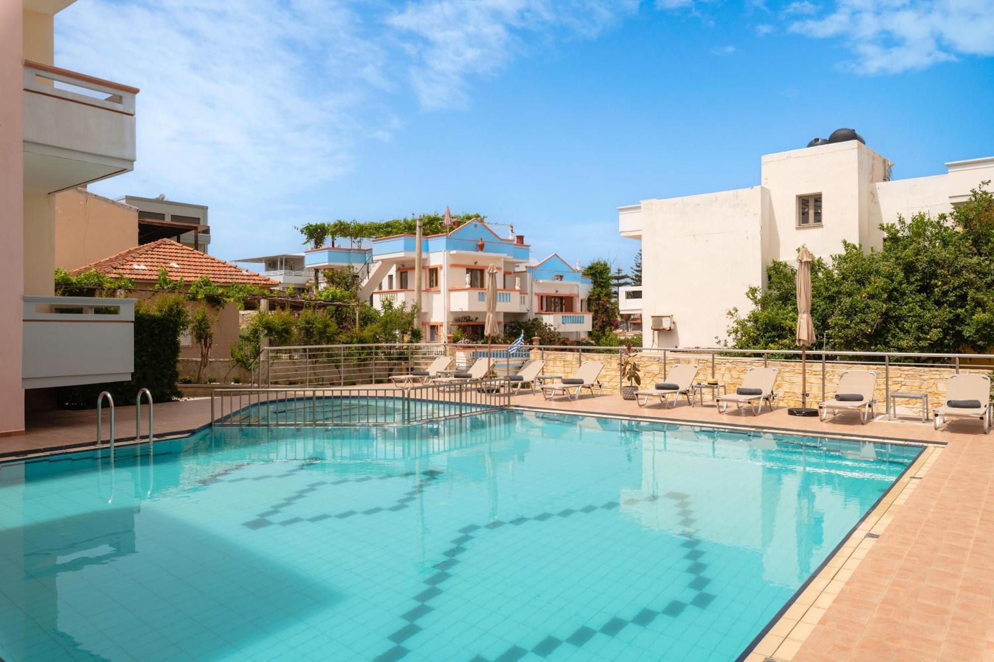 Thelesi Apartments Stalos Exterior photo